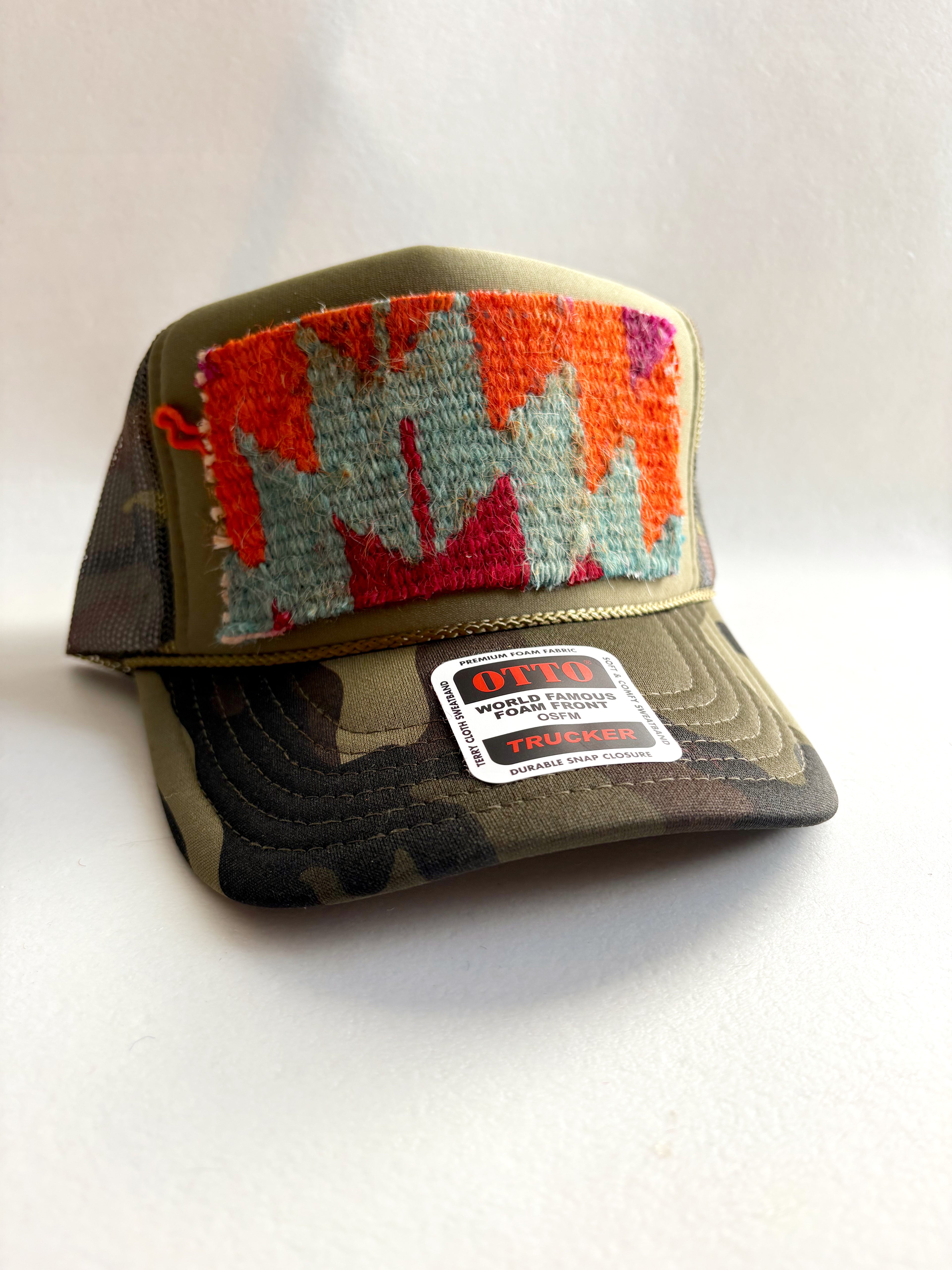 Dark Camo Trucker Hat with Purple, Teal, and Orange Kilim Patch