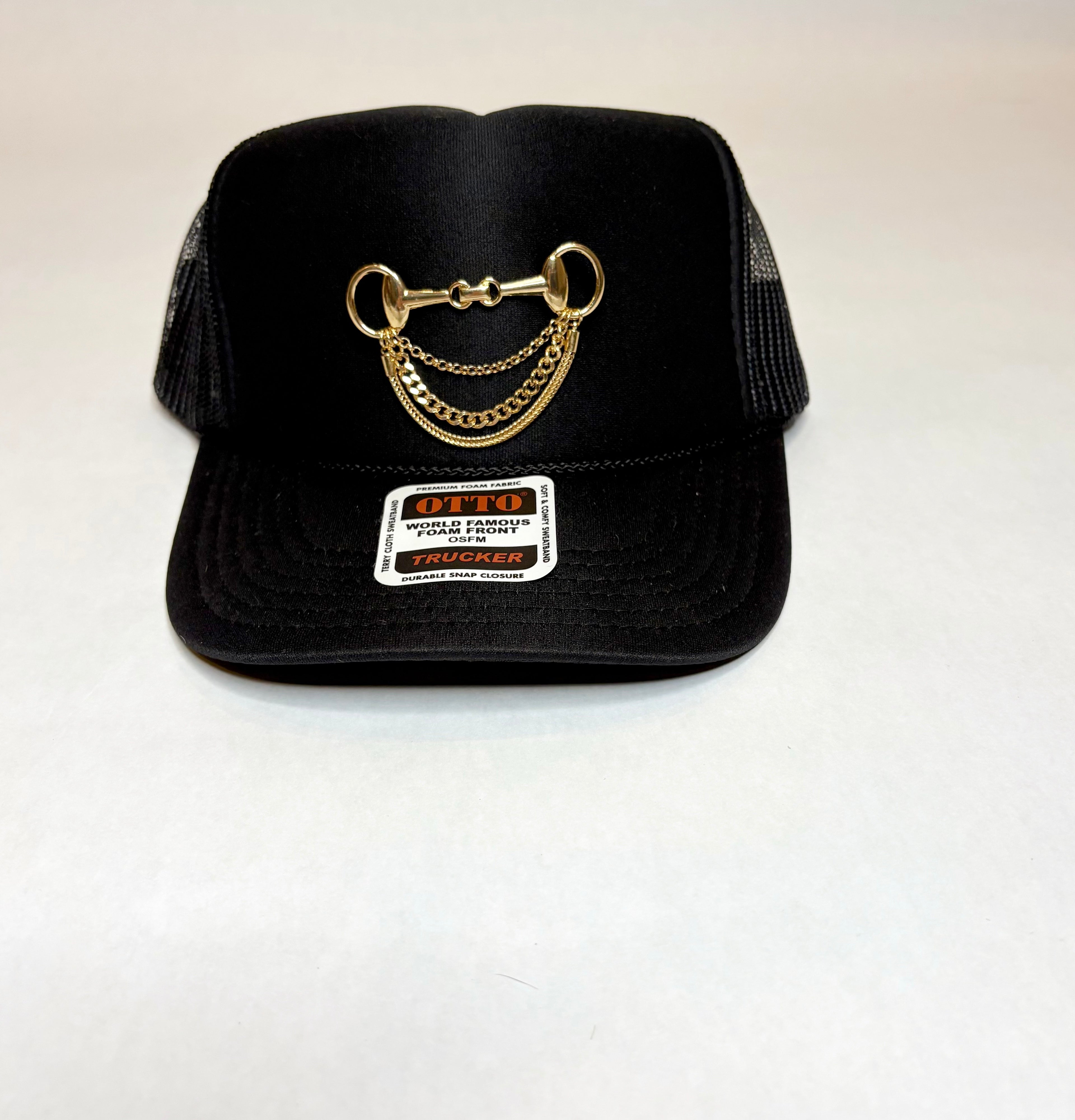 Black OTTO Trucker Hat with Gold Broach